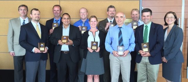 Pictured L to R: Scott Bagley (TAOC Committee), Mark Bundesmann, Edmund Harrington, Sriram Tyagarajan, Timothy Braden, Jacqui Hoffman, Michael Kobierski, Andre Shavnya, Kenneth Engstrom, Thomas Pahutski, and Katherine Lee (2015 TAOC Committee Chair)