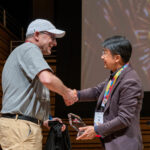 Organizers Ed Mingji Award Handshake RPI